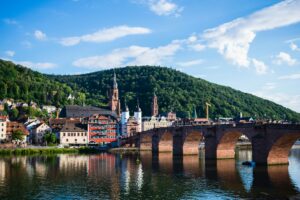 View of Heidelberg from river with bridge to the right