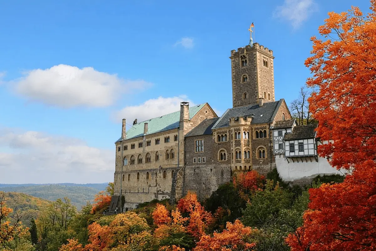 Wartburg Castle surrounded by bright fall foliage