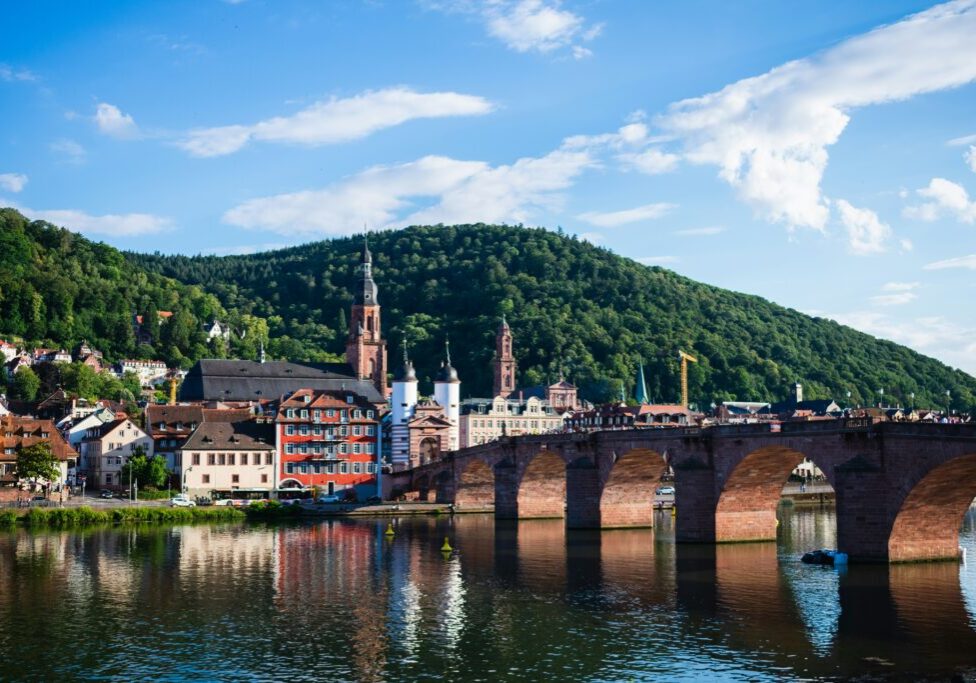View of Heidelberg from river with bridge to the right